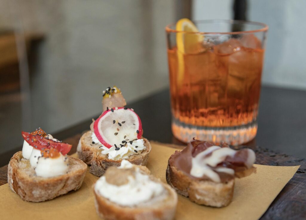 Delicious Italian crostini with a refreshing Aperol Spritz in Firenze, Italy.